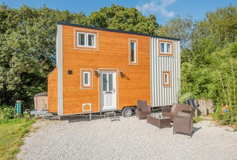 Take a look inside this stunning tiny home on wheels – that costs just $50,000